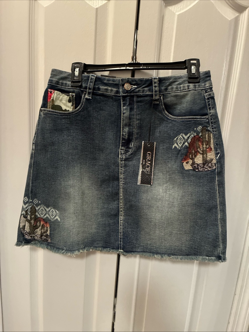 Grace ladies embroidered mini skirt size large